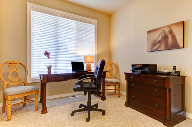 By placing your desk right in front of the window, and including some professional artwork with matching office furniture, converting an unused bedroom in the house can work perfectly for a home office.